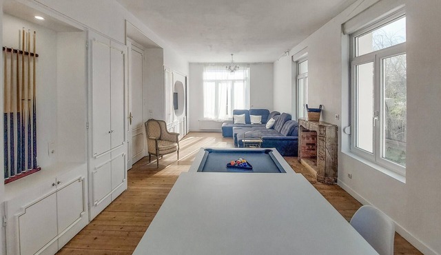 This spacious and attractive vacation home is set on a huge plot with a small stream in the garden.